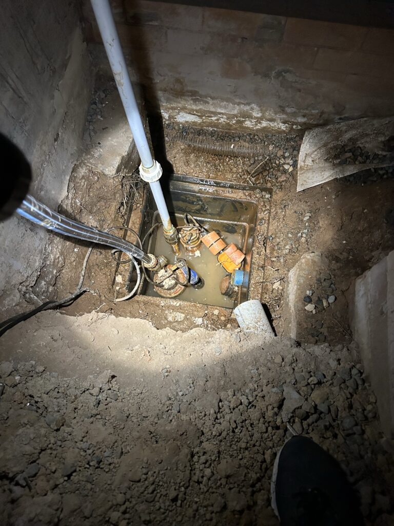 Local plumbers repairing a blocked sewer in charlestown