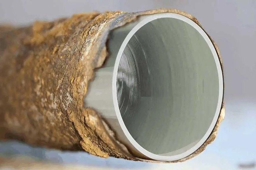 A cracked pipe repaired with Pipe Relining by local newcastle plumbers