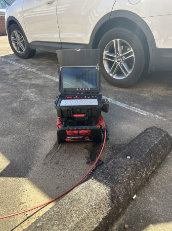 CCTV drain inspection setup outside