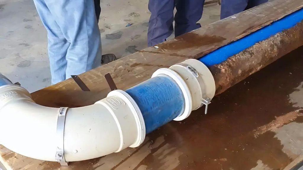 Plumbers relining a cracked pipe in Newcastle