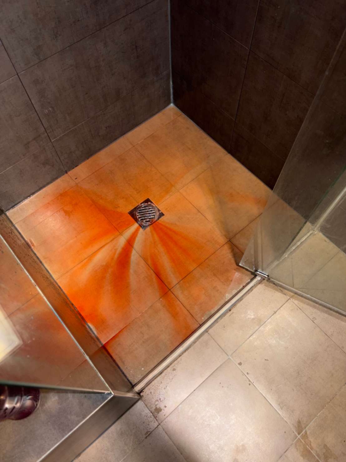 Leak detection process seen on the shower floor.