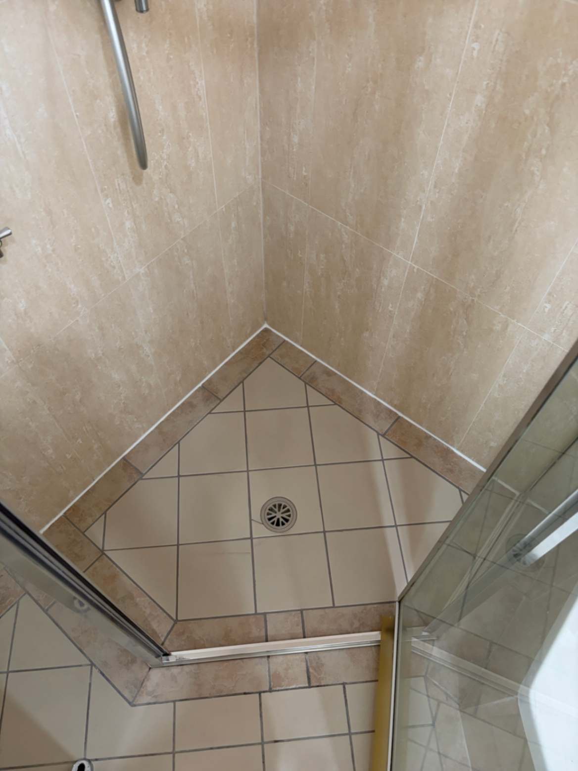 Completed shower base with properly functioning drain